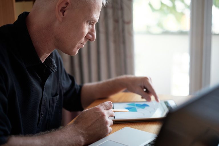 Businessman using sales lead tracking