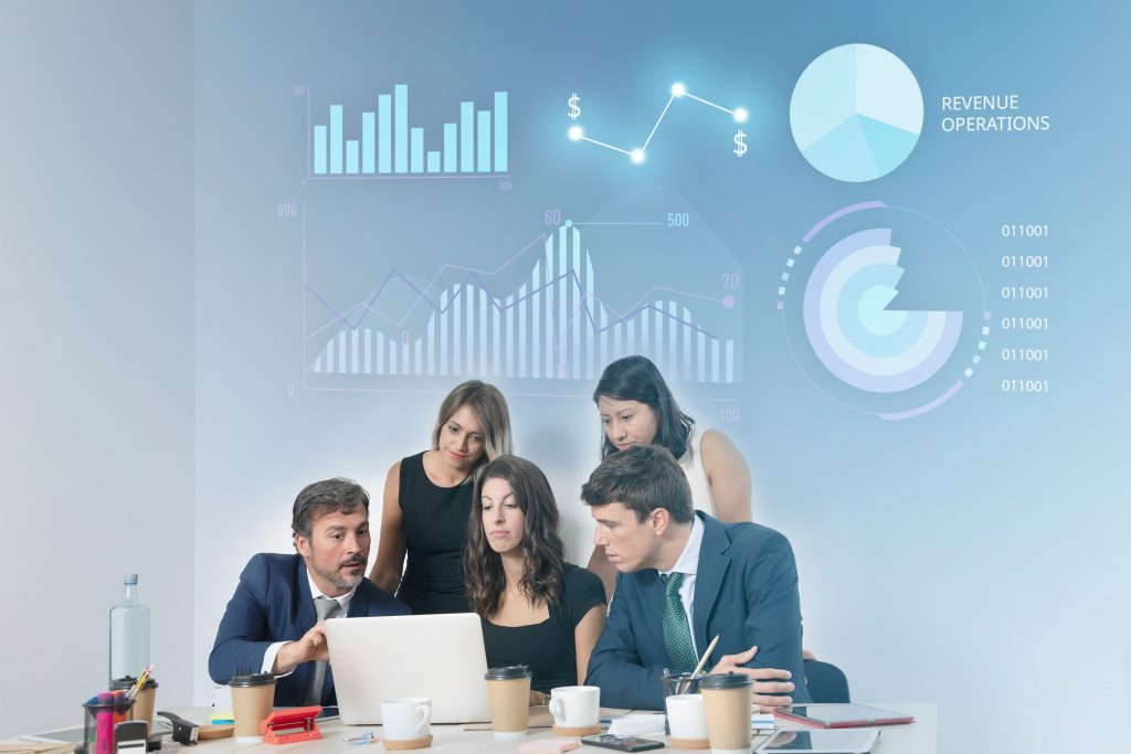 Officemate looking at the laptop