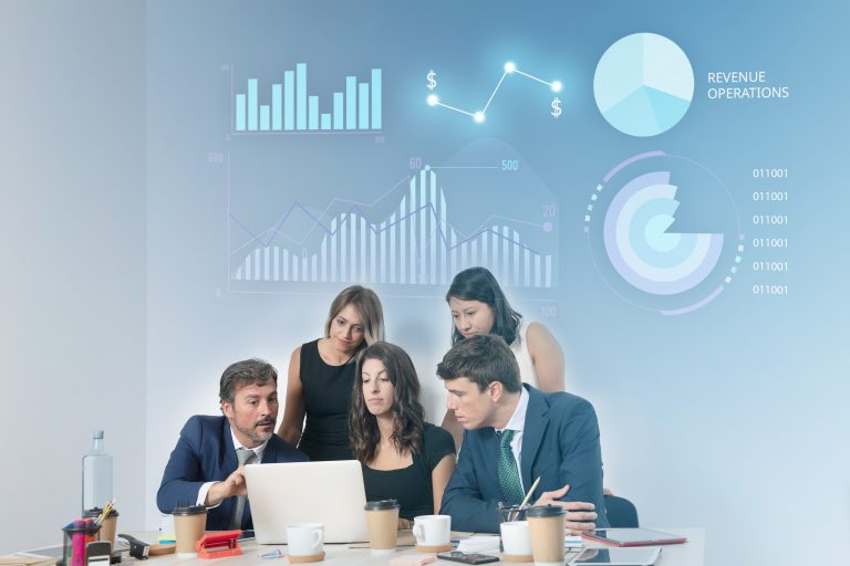 Officemate looking at the laptop